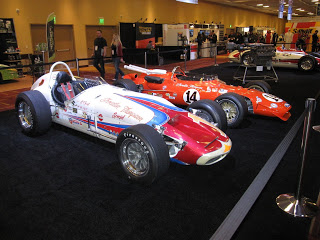 Several of A.J. Foyt's Indy Cars on display at the PRI Show.